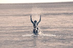 woman bathes in the sea