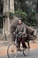 Woman on the Bike, Asia