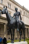 statue of a woman on horse