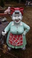 woman in apron wooden statue