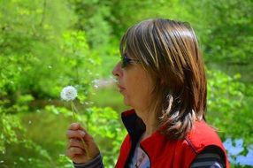 Portrait of the woman with the dandelion