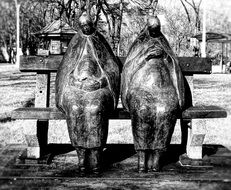 statues of women in the park as art