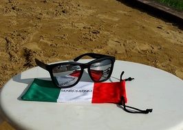 sunglasses on the flag on the table