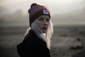 portrait of a blonde on a gray background