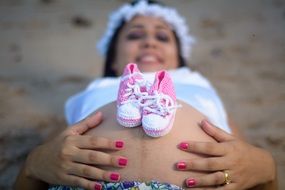 pregnant woman with booties