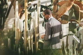 man in cactus alley