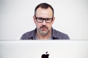 Man working on a MacBook