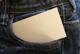 business card in jeans pocket