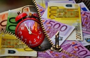 euro, lightning and alarm clock