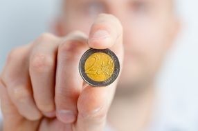 coin in hand close up