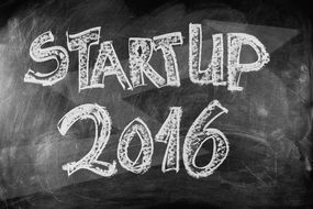 Start-up 2016 sign on a blackboard