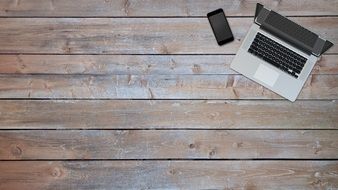 Laptop on Desk Wood