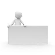 figure of a man behind a white stand