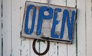 open sign on wooden door