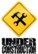 yellow sign under construction
