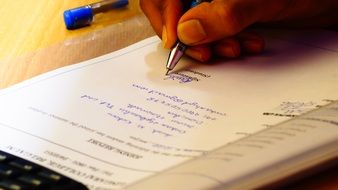 signing a document close-up
