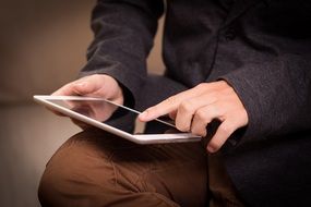 tablet in human hands