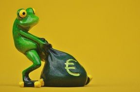 ceramic frog with money bag