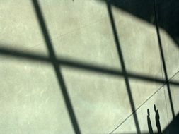 shadows of people on the wall