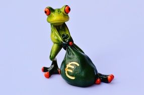 green frog with a green bag of money