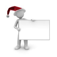 figurine of man in red santa hat with sheet of paper