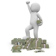 man sculpture on banknotes