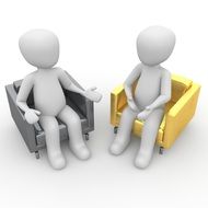 clipart of human figures sit on gray and yellow chairs