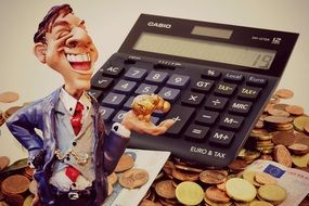 figure of a man with a gold pig, money and calculator