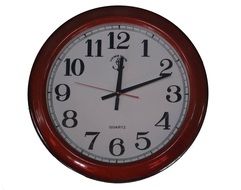 wall clock in brown frame