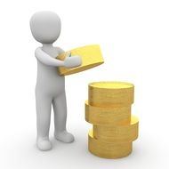 a human figurine stacked a coin tower