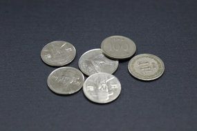 coins lie on a gray surface