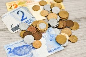 brazilian Money and coins on bills