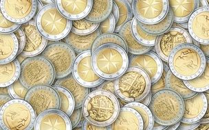 a lot of coins on the table