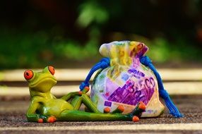 ceramic frog and money bag