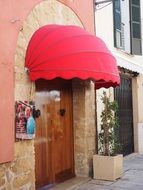 red facade awning