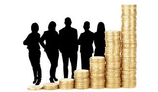 silhouettes of people behind the towers of coins