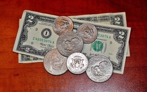 dollar banknotes and coins