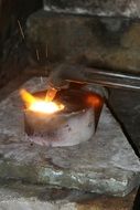burning bronze ingot