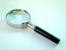 magnifying Glass on green background