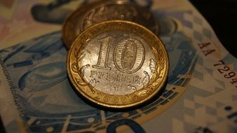 ten Ruble coin on bill, Russian money, macro