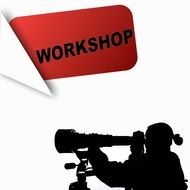 silhouette of a man with a camera at a workshop