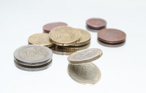 euro coins on a glass table