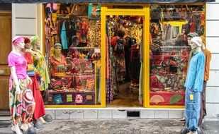 Mannequins on street in front of shop