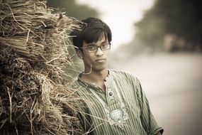 young man near the straw