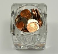 Money in the glass cup