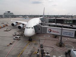 white plane at the airport