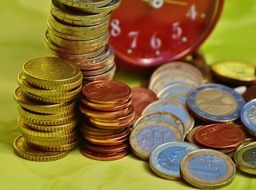 coins near the clock