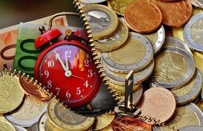 wallpaper with red alarm clock and euro coins