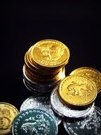 coins on a dark background