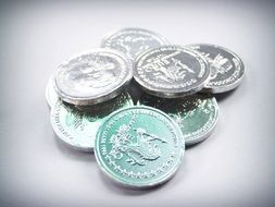 coins on a light surface